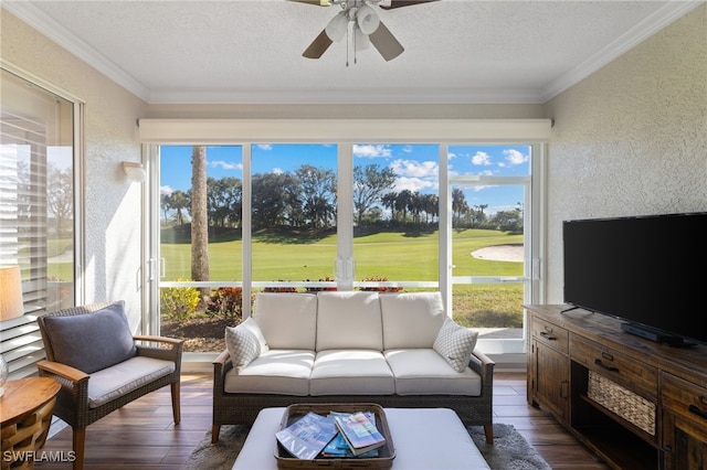 sunroom with ceiling fan