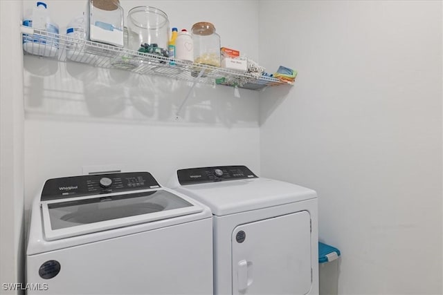 laundry area with laundry area and washing machine and dryer