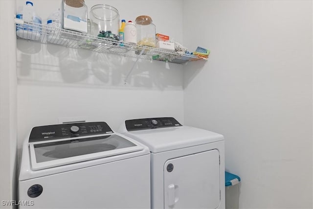 42443 Cascade Dr, Punta Gorda, FL 33982 - clothes washing area featuring separate washer and dryer and laundry area