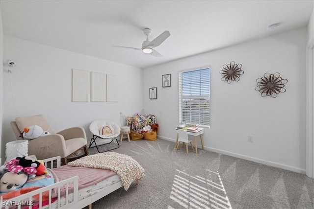 bedroom featuring a ceiling fan, baseboards, and carpet floors