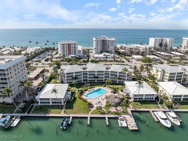 birds eye view of property featuring a water view