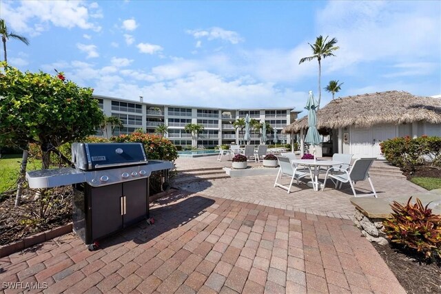 view of patio with a grill