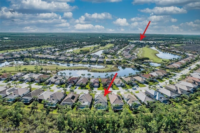 9062 Shadow Glen Way, Fort Myers, FL 33913 - aerial view of property and surrounding area featuring nearby suburban area and a large body of water