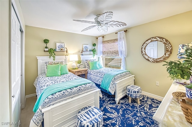 bedroom featuring a closet and ceiling fan