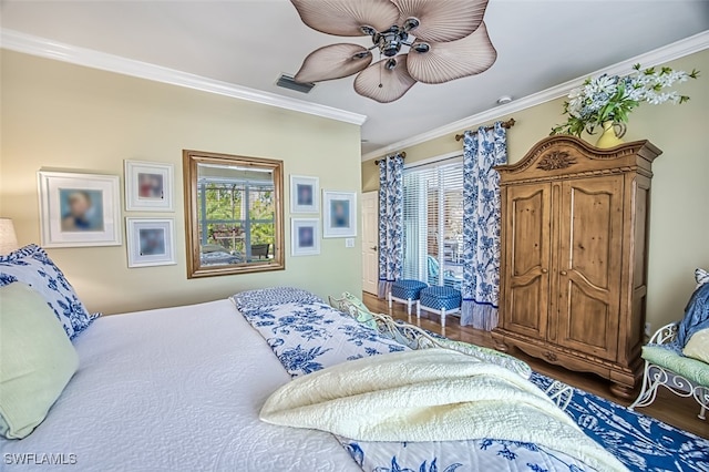 bedroom featuring multiple windows, wood-type flooring, ceiling fan, and crown molding