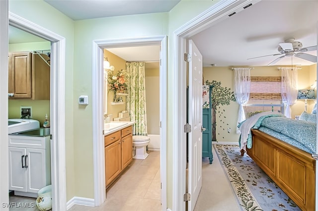 full bathroom featuring tile patterned flooring, vanity, shower / tub combo, ceiling fan, and toilet