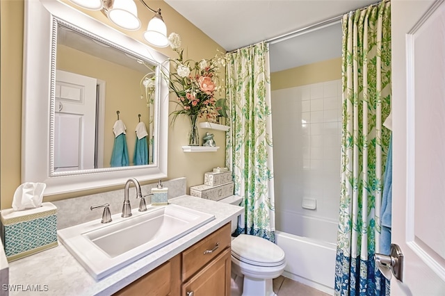 full bathroom with shower / bath combo, vanity, and toilet