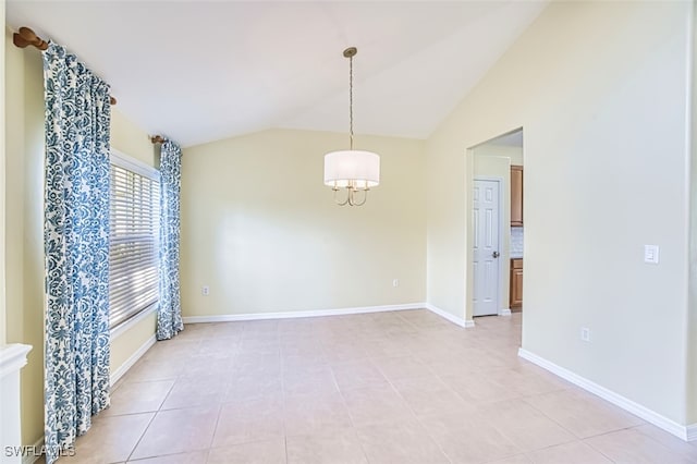 empty room featuring light tile patterned floors, baseboards, an inviting chandelier, and lofted ceiling