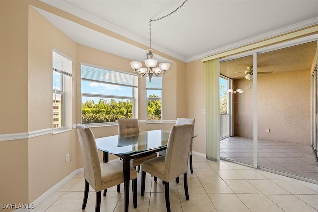 dining space with light tile patterned floors, crown molding, and ceiling fan with notable chandelier