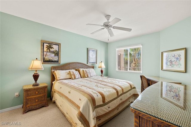 bedroom featuring ceiling fan and light colored carpet