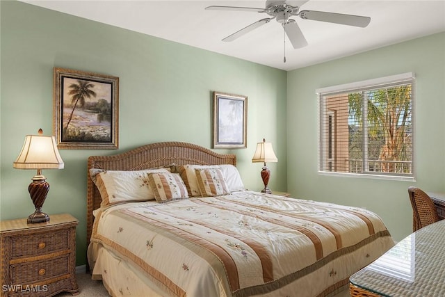 carpeted bedroom featuring ceiling fan