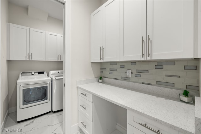 laundry area featuring washer and clothes dryer