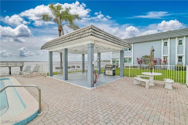 view of patio featuring a gazebo and area for grilling