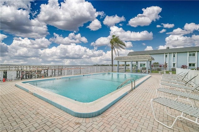 view of pool featuring a patio area