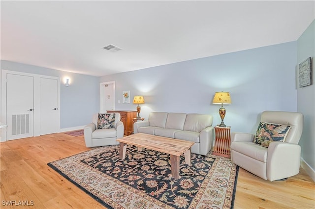 living room featuring light wood-type flooring