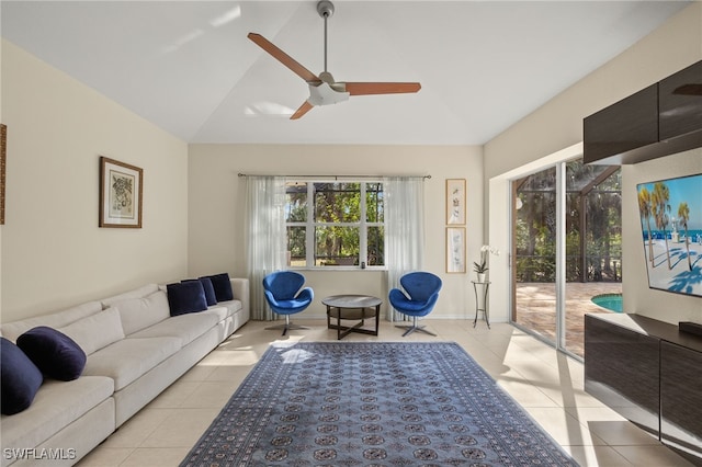 tiled living room with vaulted ceiling and ceiling fan