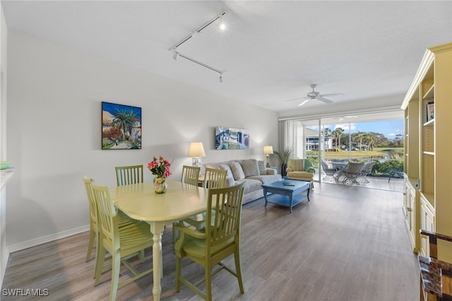 dining room featuring hardwood / wood-style floors and ceiling fan