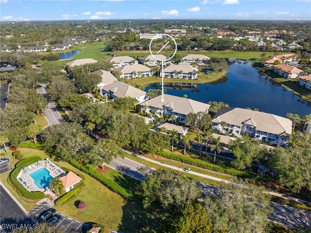 drone / aerial view with a water view