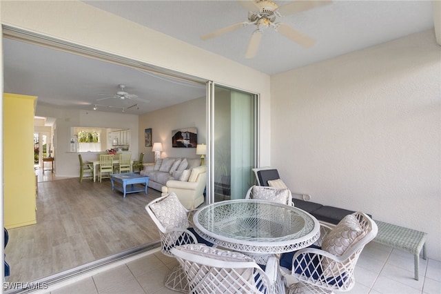 view of patio featuring ceiling fan