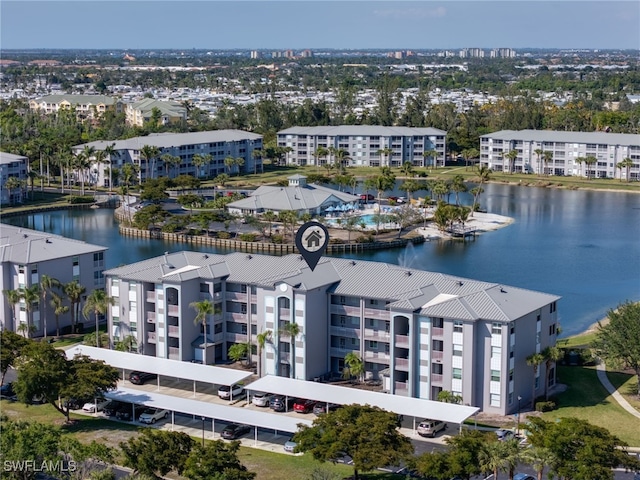 drone / aerial view with a water view