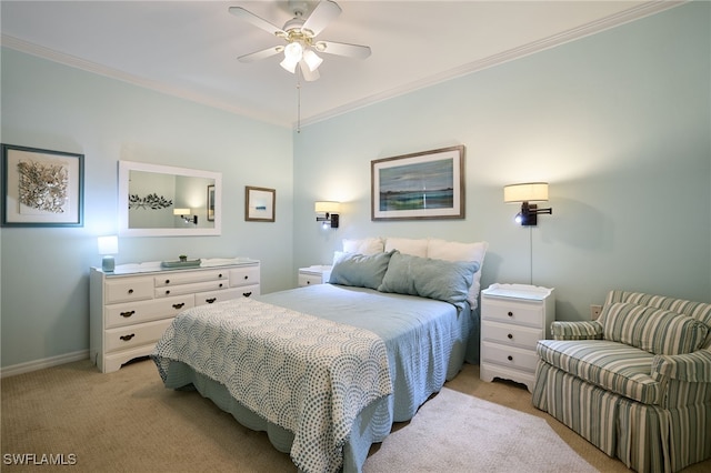 carpeted bedroom featuring crown molding and ceiling fan