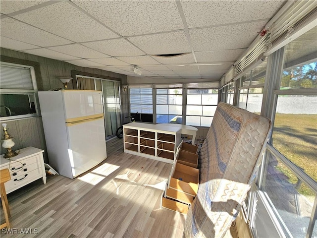 sunroom / solarium with a drop ceiling