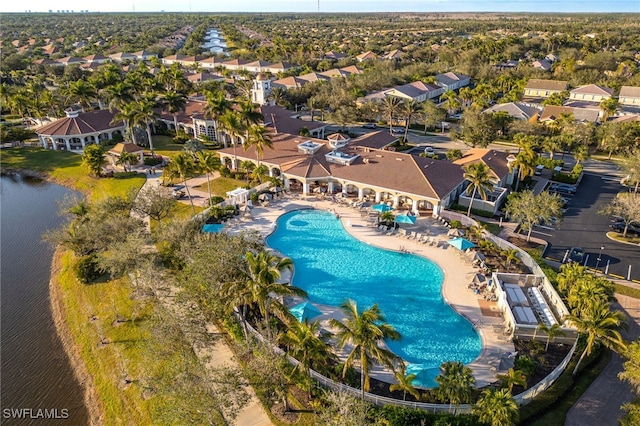 birds eye view of property featuring a water view