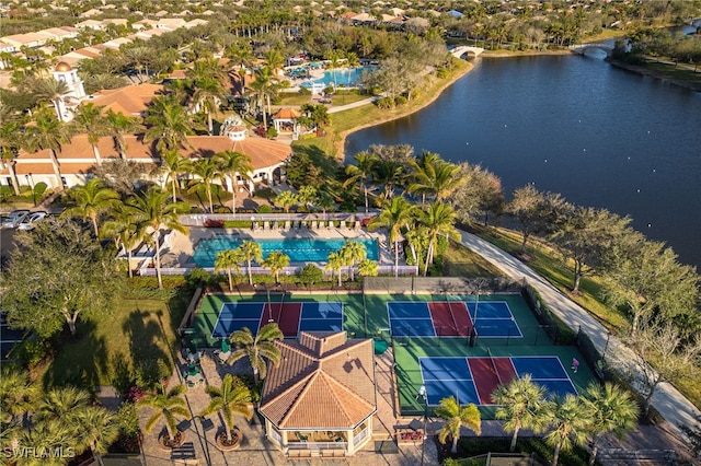 bird's eye view with a water view