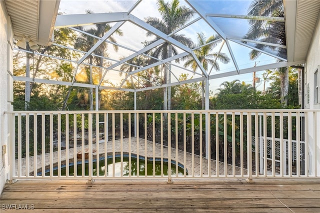 wooden deck with a lanai