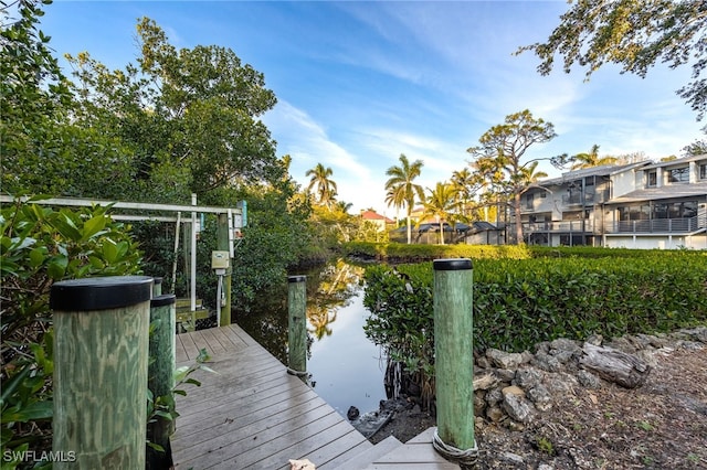 view of dock with a water view