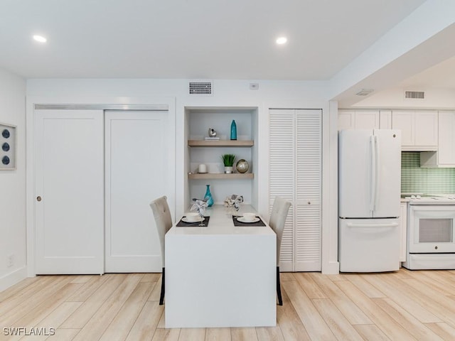 dining area featuring light hardwood / wood-style floors