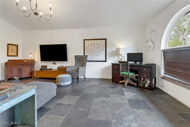 living room with a notable chandelier