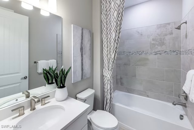 full bathroom featuring vanity, toilet, and shower / bath combo with shower curtain