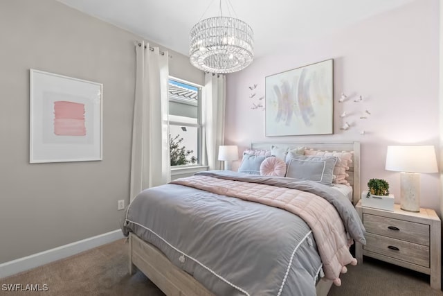 bedroom featuring carpet and a chandelier