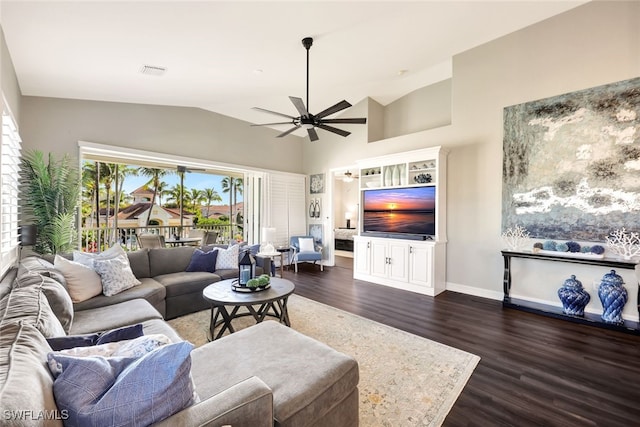 living room featuring dark hardwood / wood-style flooring, lofted ceiling, and ceiling fan