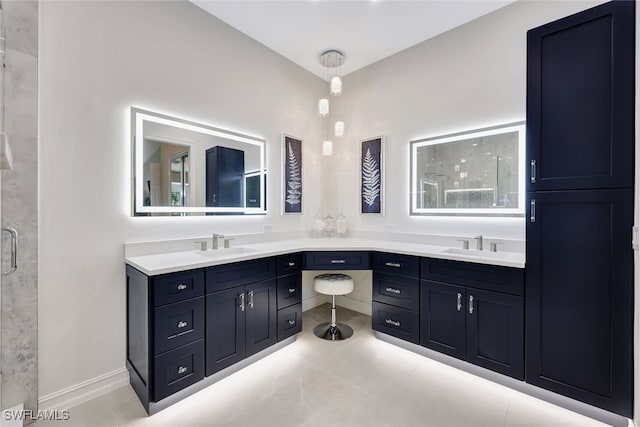 bathroom featuring vanity and tile patterned floors