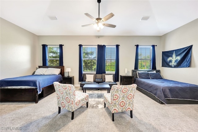 carpeted bedroom with ceiling fan