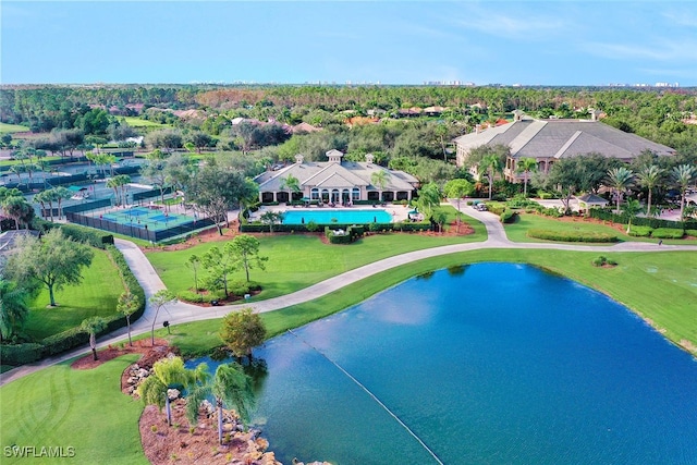 birds eye view of property featuring a water view