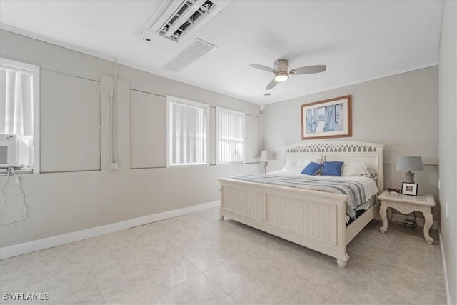 bedroom with baseboards and a ceiling fan