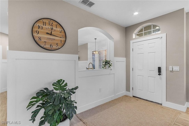 entrance foyer featuring light hardwood / wood-style floors