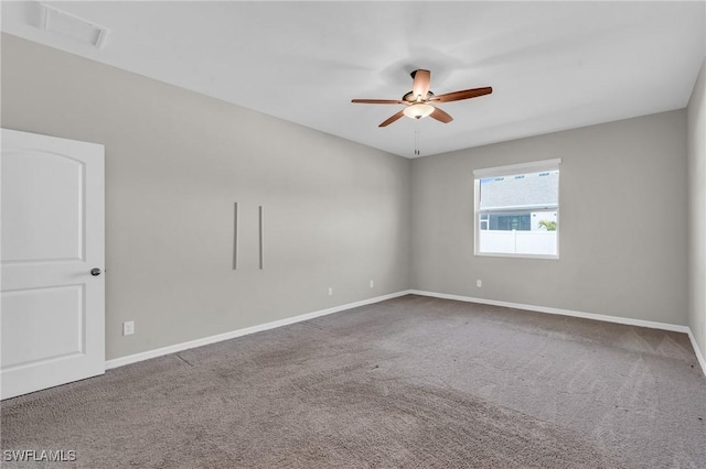 carpeted empty room with ceiling fan