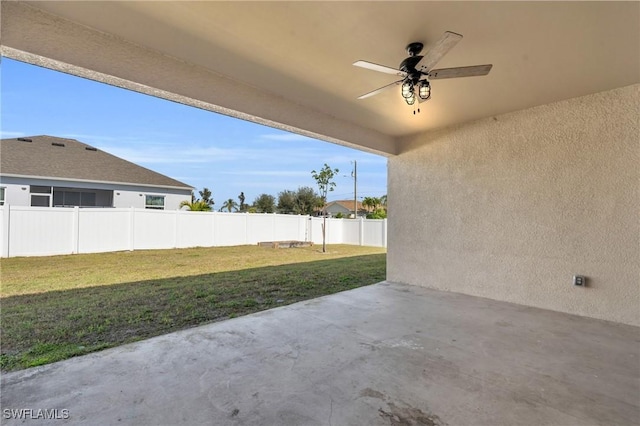 view of patio / terrace featuring ceiling fan