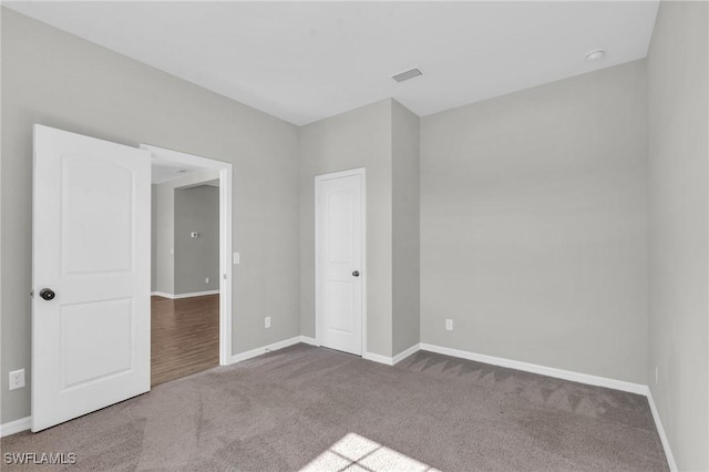 view of carpeted spare room