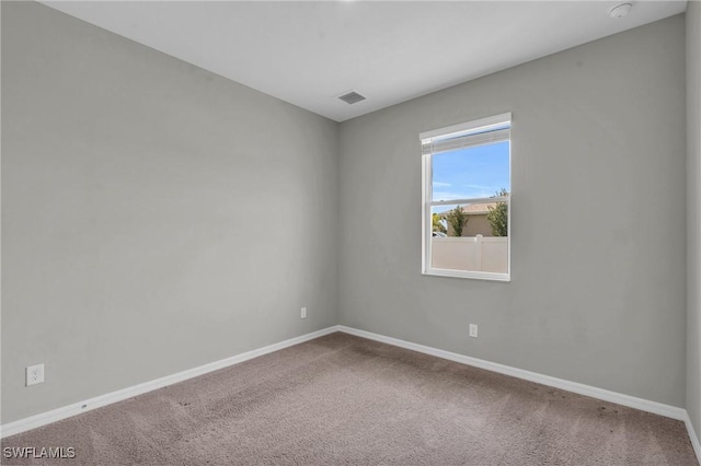 view of carpeted spare room