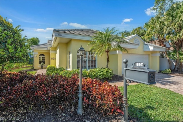 view of front of house with a garage