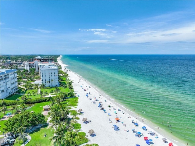 aerial view with a view of the beach and a water view