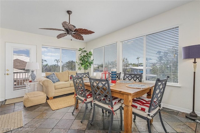 dining area with ceiling fan