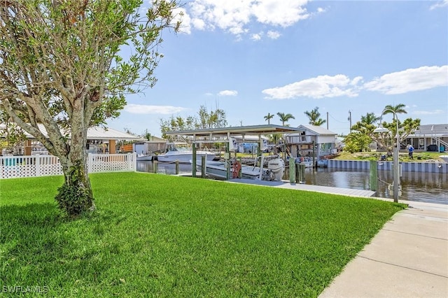 exterior space featuring a water view and a dock