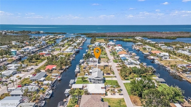 bird's eye view with a water view