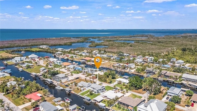 drone / aerial view with a water view